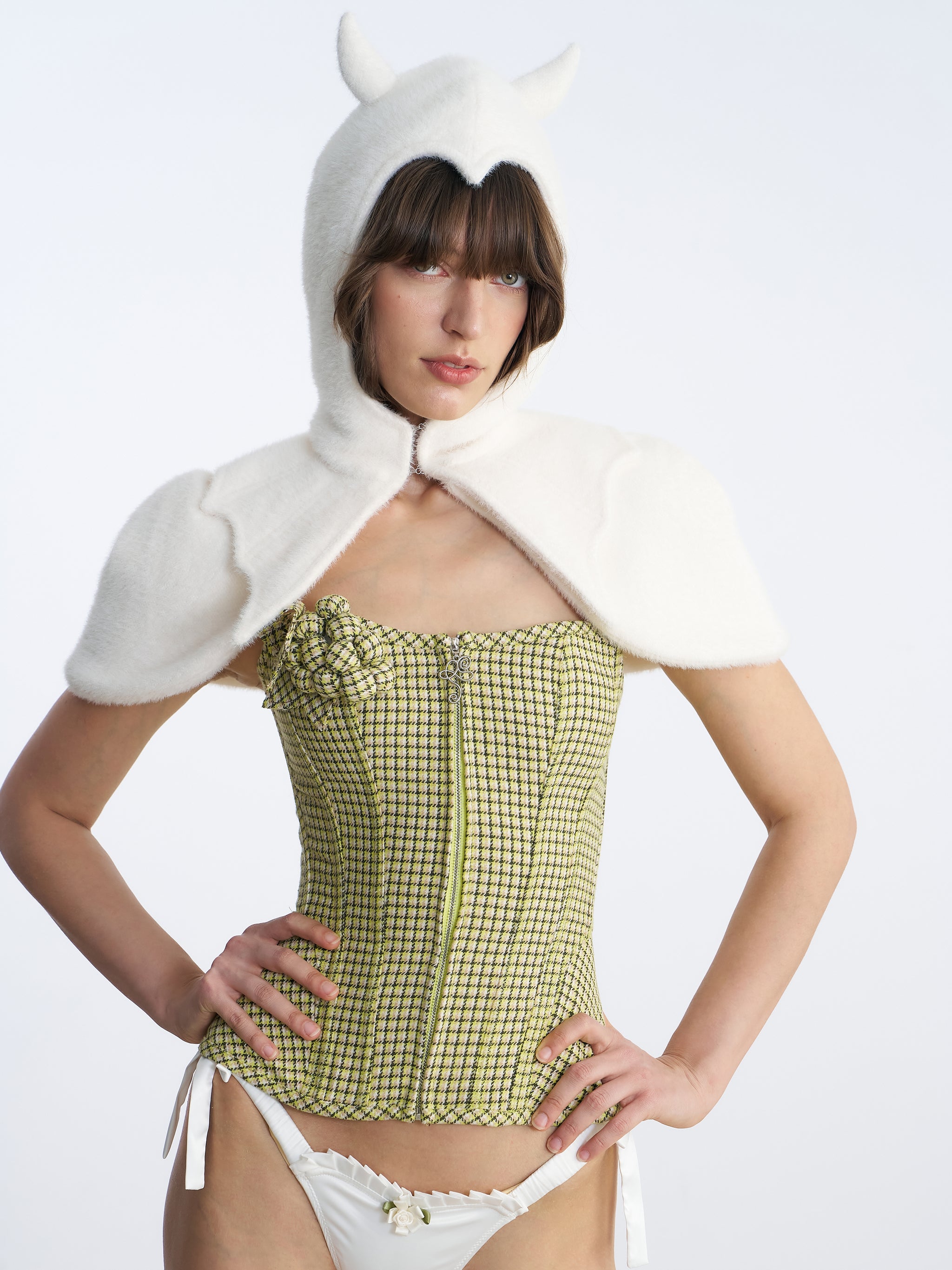 no dress corset A boat-neck corset with soft draping and lace-up detailing that fits like it was made just for her., The lace skirt with a train follows every step quiet, confident, and effortlessly feminine., No
